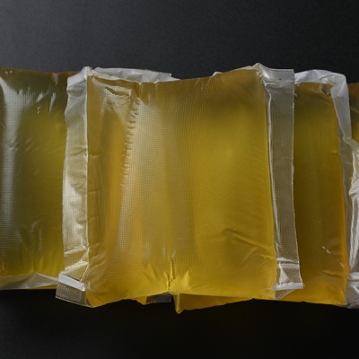 comprar Pegamento de unión de fusión en caliente amarillo a base de Eva para cartón de frutas online manufacture